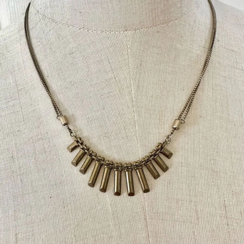 Gold tone pendant necklace